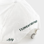 HAVVA BB cap in white with green embroidered slogan