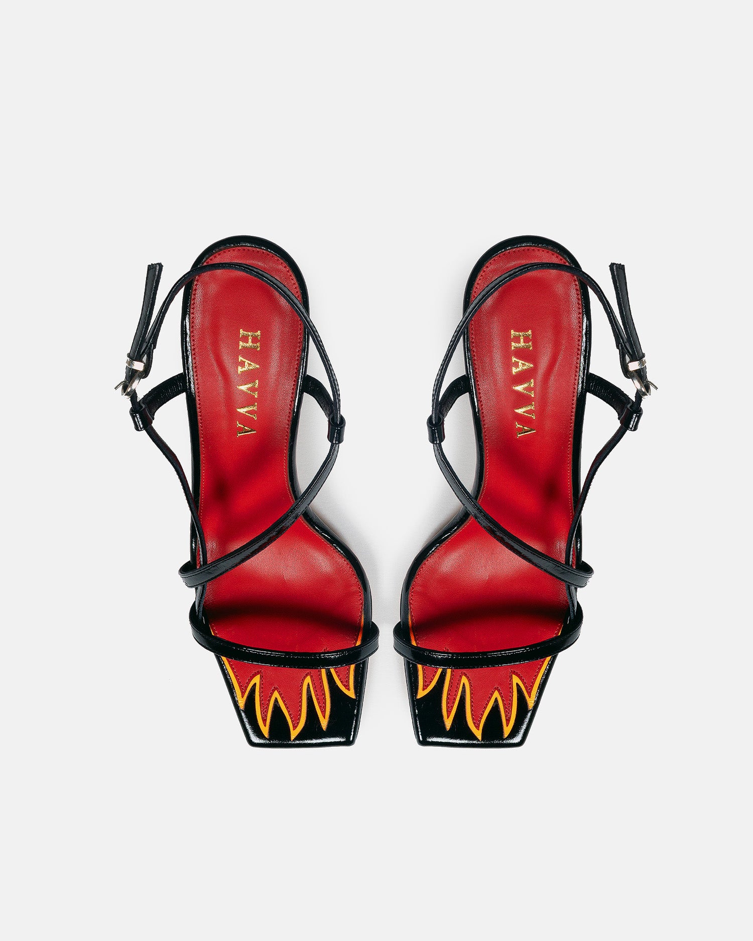 HAVVA black asymmetrical sandal with flame design within the insole